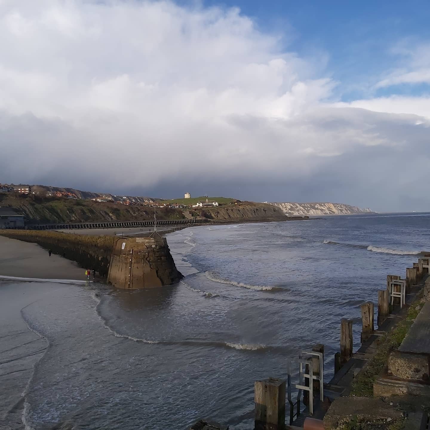 Picture of the tide going out from Folkestone Harbour